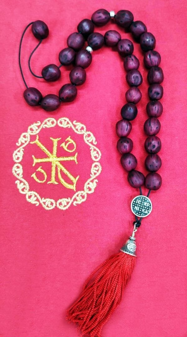 33 Red dark Nutmeg Prayer Beads with Holy Myrrh